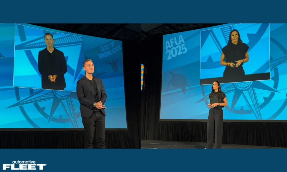 Two presenters stand before blue graphics featuring a compass and sea turtle design, highlighting fleet management innovation and leadership discussions at the annual AFLA event.