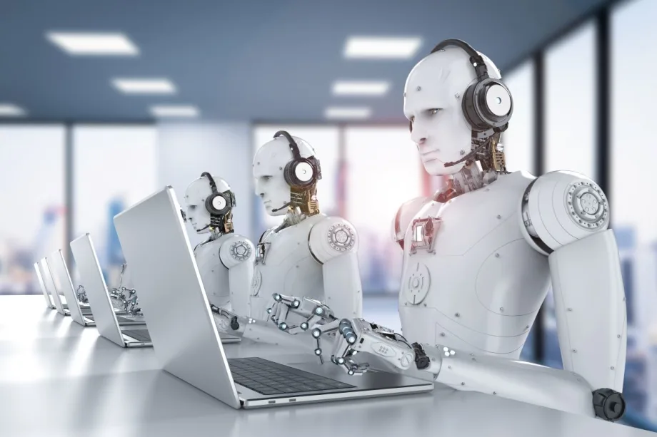 AI robots typing at laptops