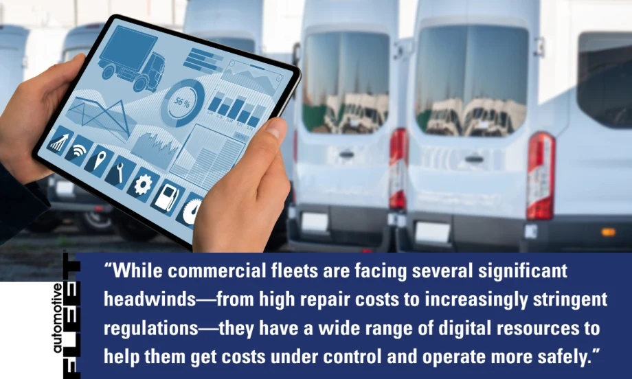 A fleet manager uses a digital tablet displaying telematics data and repair analytics in front of parked commercial vans. Modern fleet management technology helps reduce downtime, control repair costs