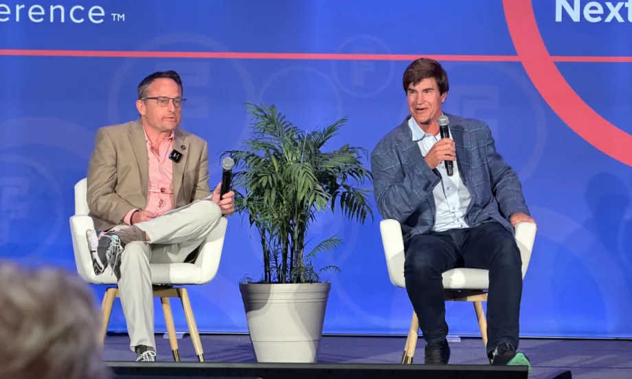 Ted Cannis and Chris Brown sit on the fleet forward stage, addressing future realities for fleets.