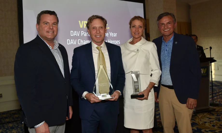 Award winners holding plaques at national DAV awards ceremony.