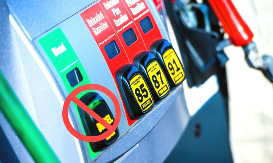 row of fuel nozzles, diesel nozzle has ban circle over it.