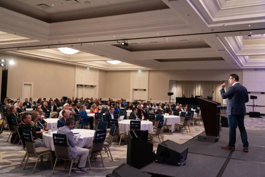 A room of people attending a Fleet Forward Conference seminar.