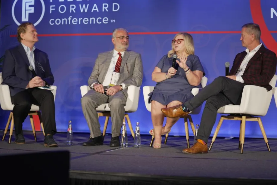 Panelists on stage at FFC.