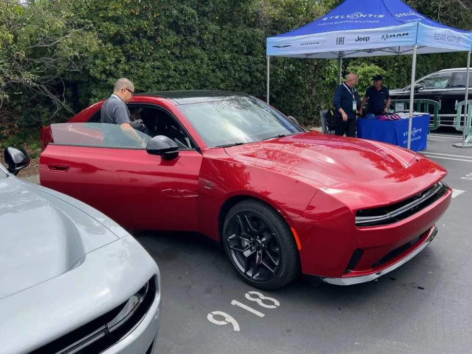 A red Dodge Challenger on display.