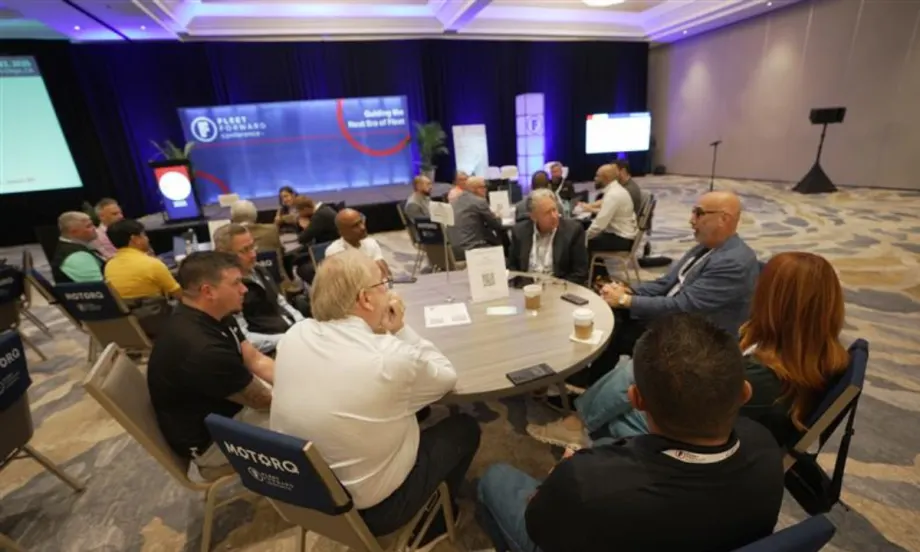 Fleet Forward session participants are pictured, watching the stage.