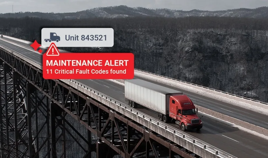 Semi-truck on highway with digital maintenance alert overlay, illustrating AI-driven predictive maintenance, fault detection, and fleet management technology.