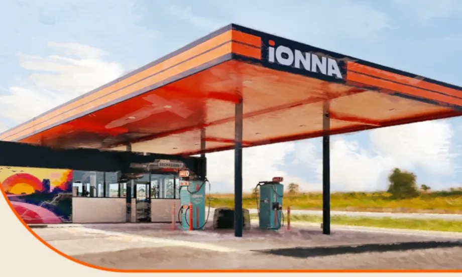 IONNA electric vehicle charging station with covered canopy and multiple chargers, representing expansion of a nationwide EV charging network.