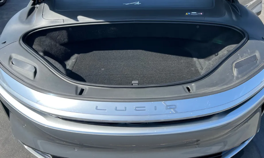 Open front trunk of a Lucid electric vehicle showing additional cargo space.