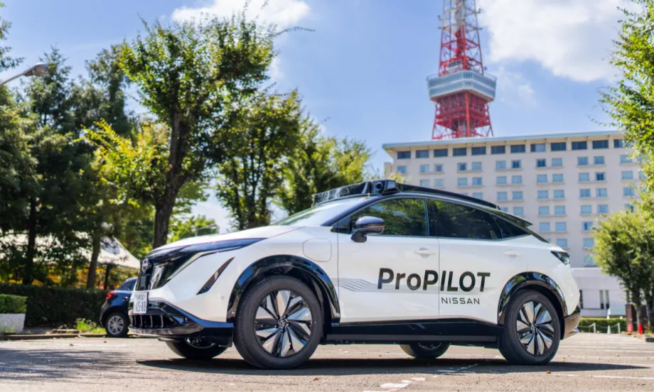 A Nissan and Wayve ProPilot system is displayed on the side of a mass-produced vehicle.