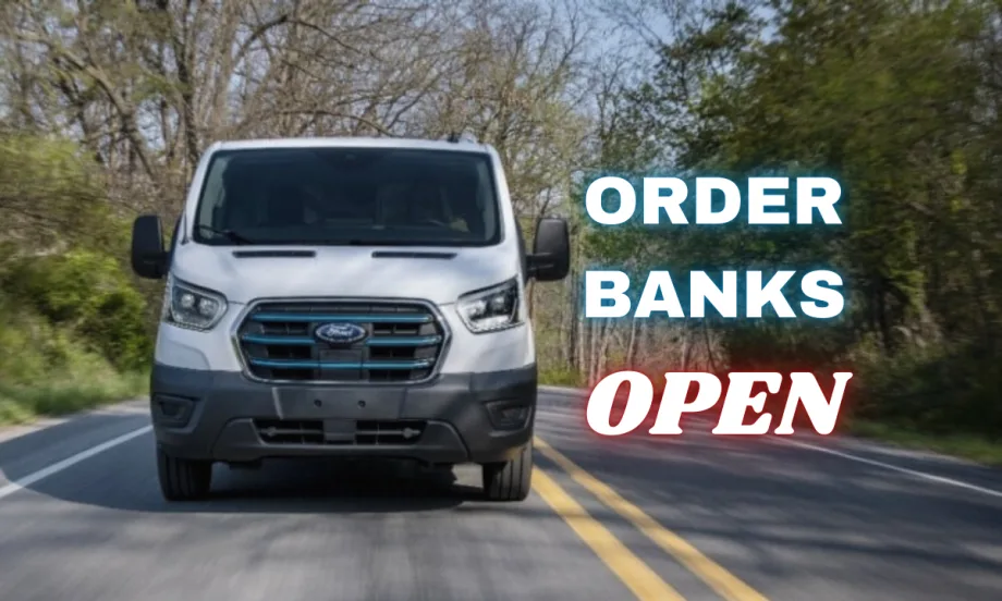 A front view of a Ford E-Transit van driving down a road surrounded by trees. Neon sign text to the right reads "Order Banks Open".