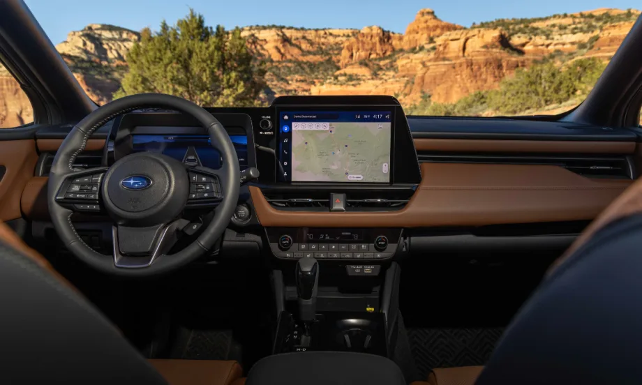 The screen display and driver's side interior of the 2026 Subaru Outback.
