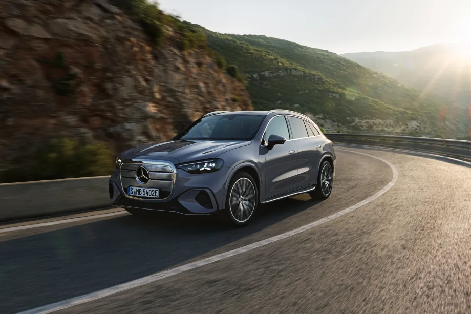 A Mercedes-Benz GLC drives on a road