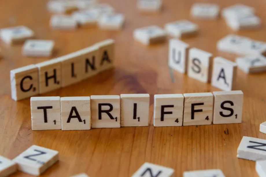 Scrabble pieces showing china, usa, and tariffs