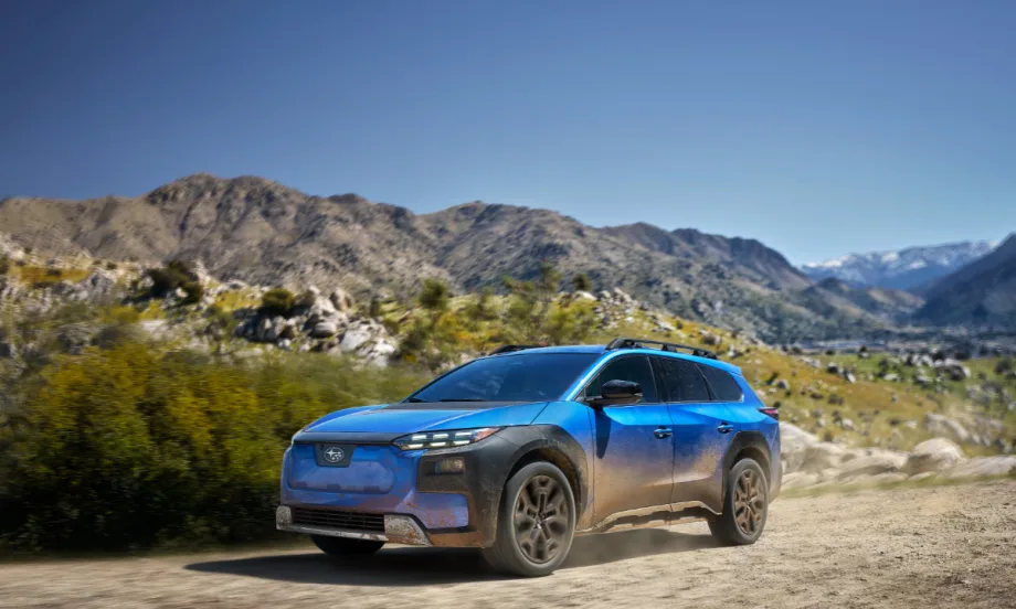 A blue 2026 Subaru Trailseeker sits on a desert landscape.