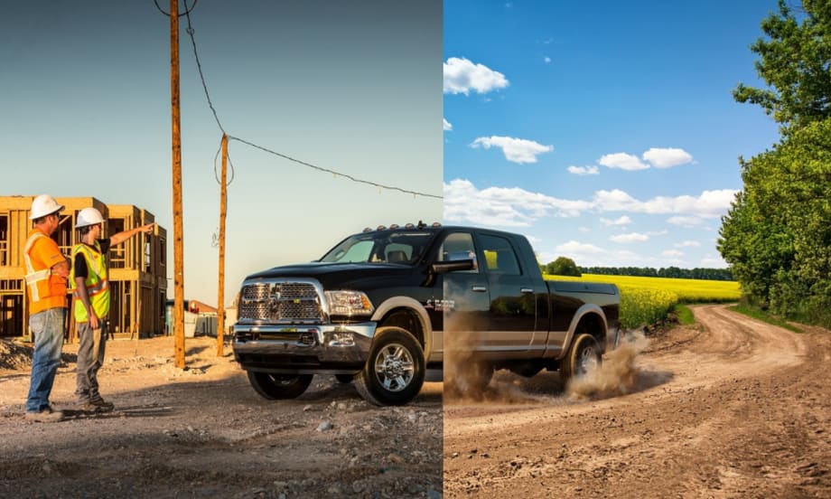 Construction workers look at a 2013 MY Ram truck.