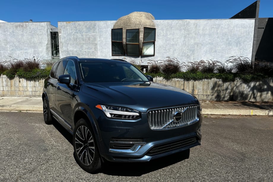A parked late-model Volvo XC90 midsize three row SUV.