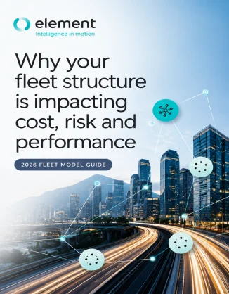 City skyline and highway with connected fleet network graphics